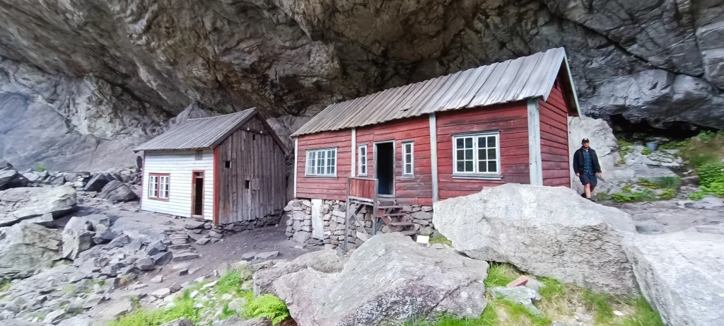 The Helleren houses built under a rock overhang at Jøssingfjord, Sokndal, Norway