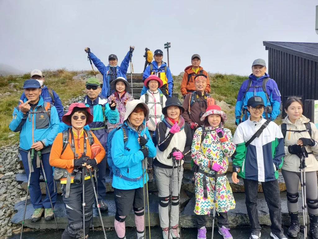 South Korean guests hiking Kjerag with a local guide in Norway