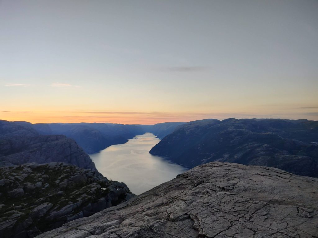 Trail runner in the mountains near Preikestolen in Norway