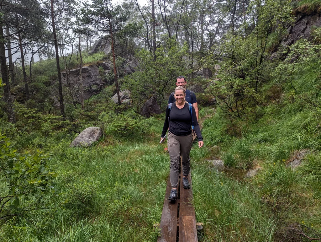 Rebecca and John hiking the Preikestolen trail on a private journey in Norway