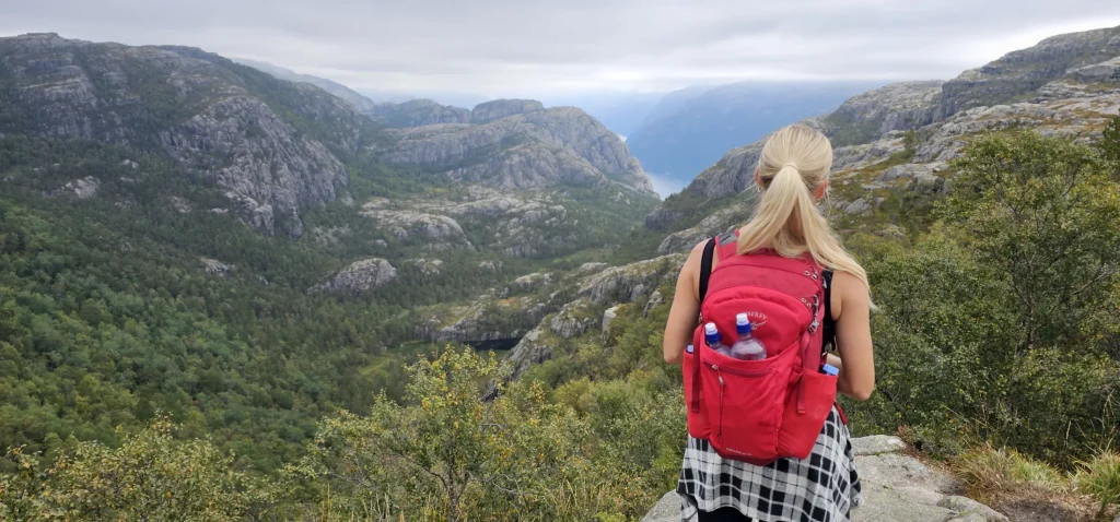 Guest at Preikestolen with Lysefjord in the background