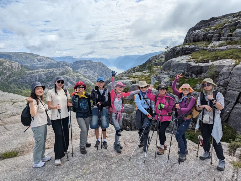 South Korean hiking group on the trail to Pulpit Rock, Norway